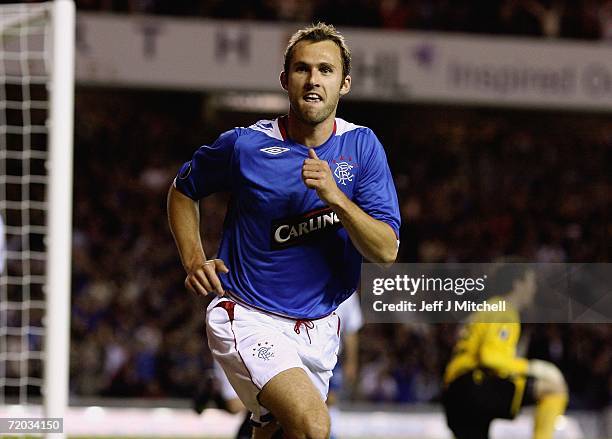 Thomas Buffel of Rangers celebrates after scoring during the UEFA Cup second leg match between Rangers and FC Molde at Ibrox stadium on September 28,...