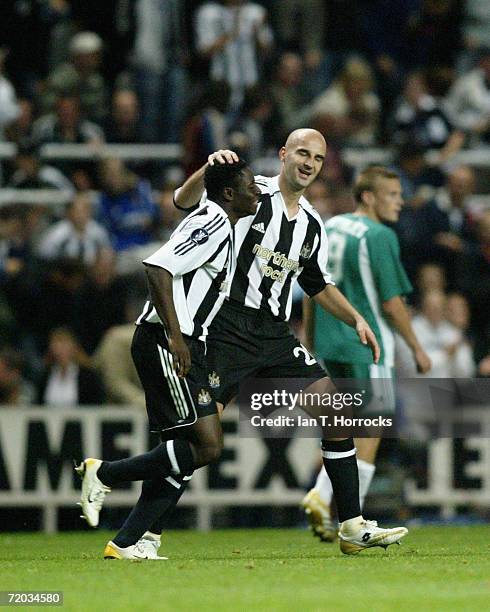 Obafemi Martins celebrates with teammate Antoine Siberski after scoring his second goal during the UEFA Cup First round, Second leg match between...