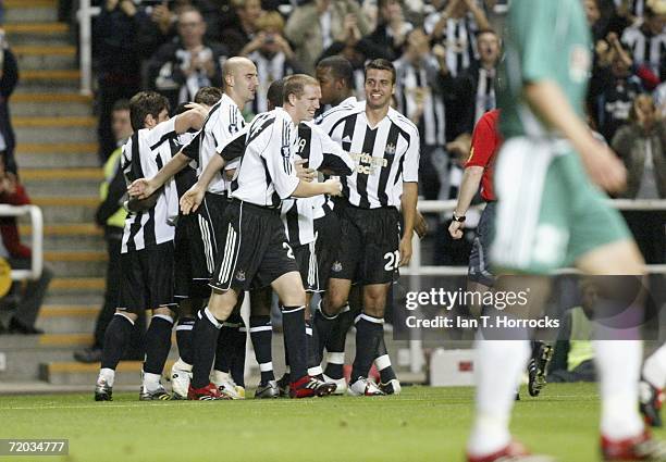 Newcastle United players celebrate after Obafemi Martins scores his second goal during the UEFA Cup First round, Second leg match between Newcastle...