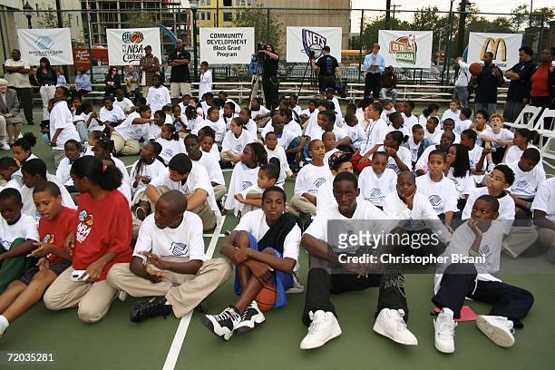 Children attend a new basketball court ribbon cutting ceremony at Jersey City Boys & Girls Club September 27, 2006 in Jersey City, New Jersey. User...