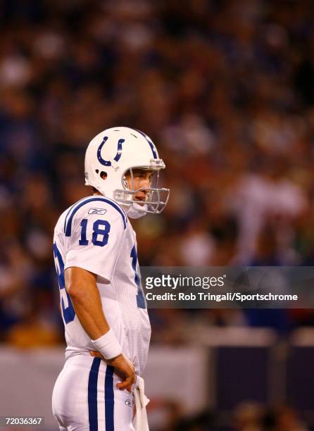 Peyton Manning of the Indianapolis Colts stands on the field against the New York Giants on September 10, 2006 at Giants Stadium in East Rutherford,...