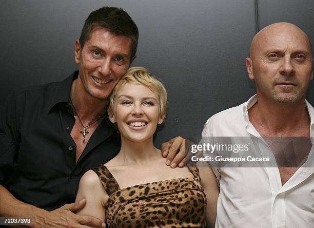 Designer Stefano Gabbana and Domenico Dolce pose with Australian singer Kylie Minogue at the Dolce & Gabbana show during the Spring/Summer 2007...