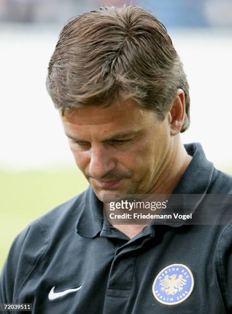 Coach Falko Goetz of Hertha looks dejected after the UEFA Cup second leg match between Odense BK and Hertha BSC Berlin at the Fionia Park on...