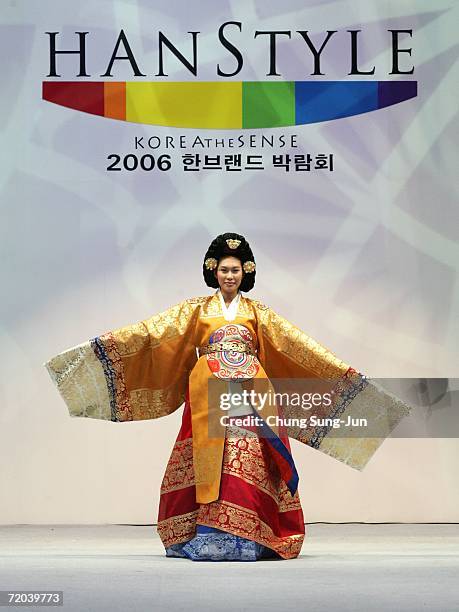 Model walks down the catwalk during the Paik Seol-Heon fashion show as part of the South Korean Traditional Costume "HanBok" fashion show on...