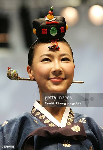 Model walks down the catwalk during the Paik Seol-Heon fashion show as part of the South Korean Traditional Costume "HanBok" fashion show on...