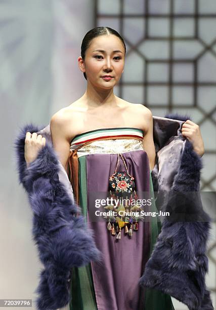 Model walks down the catwalk during the Paik Seol-Heon fashion show as part of the South Korean Traditional Costume "HanBok" fashion show on...