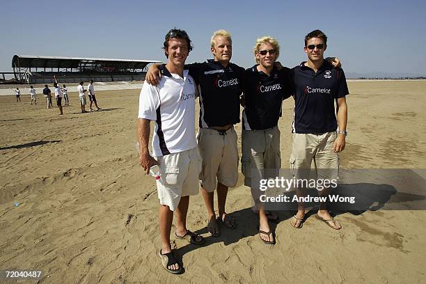 Steve Williams, Alex Partridge, Andrew Triggs Hodge and Peter Reed pose for a photo on the dried up riverbed as they visit the Shunyi Olympic...