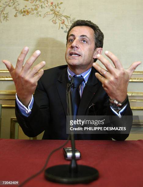 French Interior Minister Nicolas Sarkozy gestures during his press conference at the eight-country round table on immigration in Madrid, 29 September...