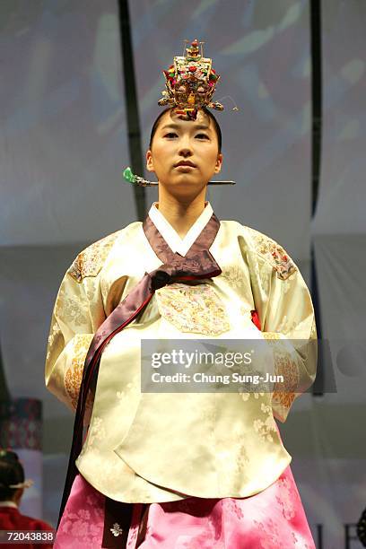 Model walks down the catwalk during the Paik Seol-Heon fashion show as part of the South Korean Traditional Costume "HanBok" fashion show on...