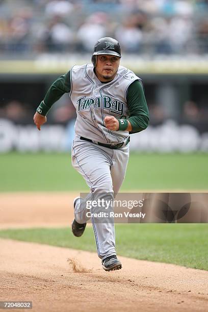 Dioner Navarro of the Tampa Bay Devil Rays runs to third base during the game against the Chicago White Sox at U.S. Cellular Field in Chicago,...