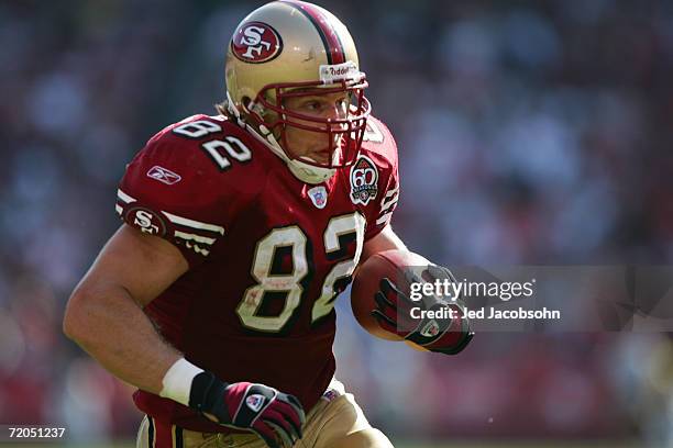 Tight end Eric Johnson of the San Francisco 49ers runs with the ball against the Philadelphia Eagles at Monster Park on September 24, 2006 in San...
