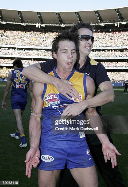 Ben Cousins of the Eagles celebrates after winning the AFL Grand Final match between the Sydney Swans and the West Coast Eagles at the Melbourne...