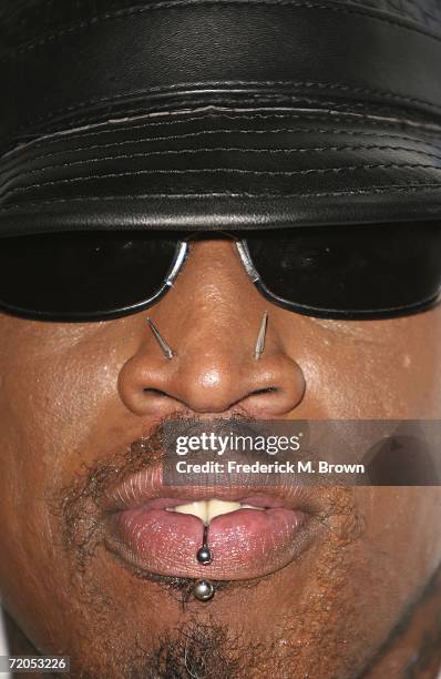 Former NBA basketball player Dennis Rodman attends the Earvin "Magic" Johnson Celebrates 25 Years of Business gala at the Beverly Hilton Hotel on...