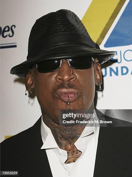 Former NBA basketball player Dennis Rodman attends the Earvin "Magic" Johnson Celebrates 25 Years of Business gala at the Beverly Hilton Hotel on...
