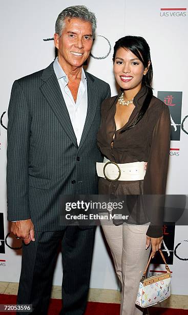 Boxing announcer Michael Buffer and Christine Prado arrive at the Tao Nightclub at the Venetian Resort Hotel Casino during the club's anniversary...