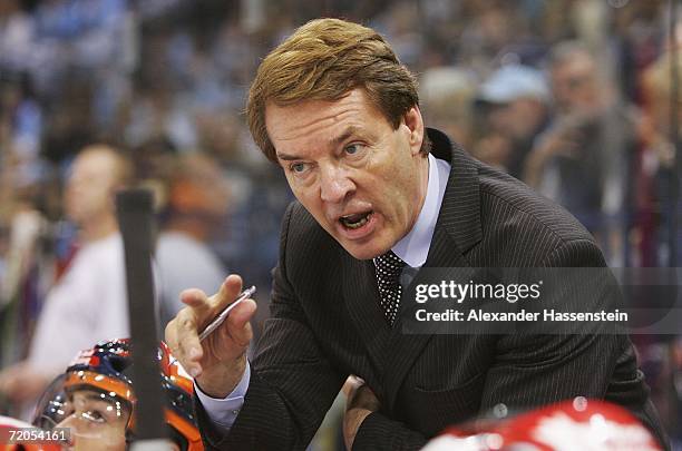 Berlin's headcoch Pierre Gilbert Page gives instructions to his team during the DEL Bundesliga game between Hamburg Freezers and Eisbaeren Berlin at...