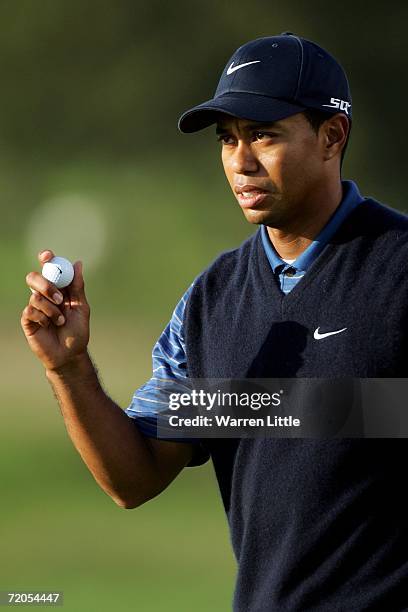 Tiger Woods of USA acknowledges the crowd during the third round of the WGC American Express Championship at The Grove on September 30, 2006 in...