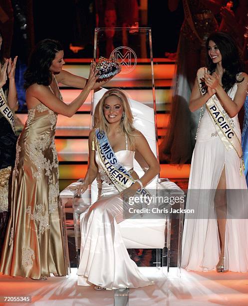 Miss World 2005 Unnur Birna Vilhjalmsdottir hands over the Crown to Tatana Kucharova of the Czech Republic as she wins Miss World 2006 at Warsaw's...