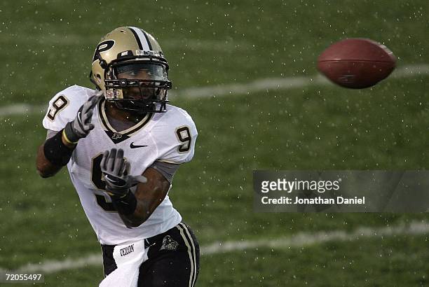Wide receiver Dorien Bryant of the Purdue Boilermakers looks in the ball as he attempts to make a catch in the rain against the Notre Dame Fighting...