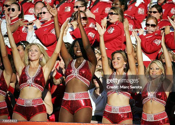 Alabama Crimson Tide cheerleaders shout as there team plays the Florida Gators at Ben Hill Griffin Stadium at Florida Field September 30, 2006 in...