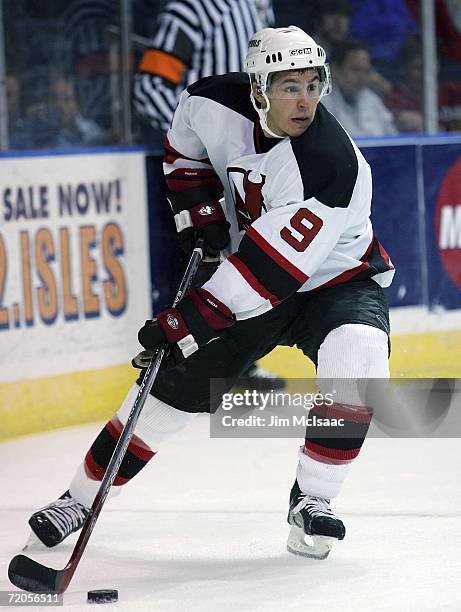 Zach Parise of the New Jersey Devils looks to make a play against the New York Islanders during their NHL pre season game on September 30, 2006 at...