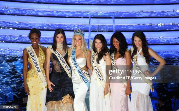 Newly-crowned Miss World 2006 Tatana Kucharova of Czech Republic poses with finalists of The Miss World competition during 2006 final at Warsaw's...