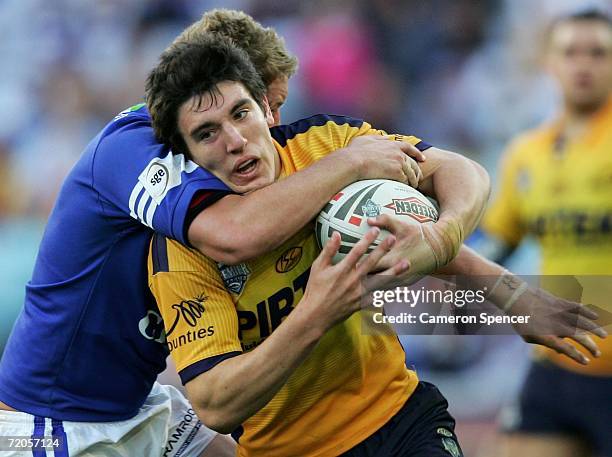 Joel Reddy of the Eels runs with the ball during the 2006 Premier League Grand Final between the Parramatta Eels and the Newtown Jets at Telstra...