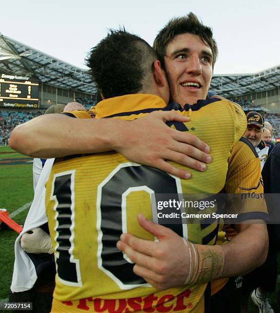 Joel Reddy hugs Eels team mate Peter Lewis after winning the 2006 Premier League Grand Final between the Parramatta Eels and the Newtown Jets at...