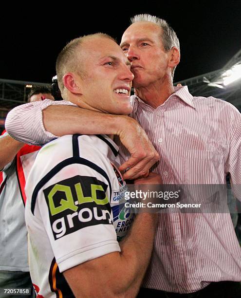 Wayne Bennett coach of the Broncos kisses team captain Darren Lockyer after winning the NRL Grand Final between the Brisbane Broncos and the...