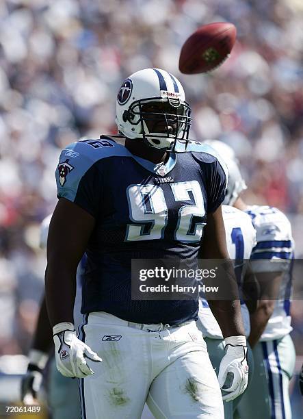 Albert Haynesworth of the Tennessee Titans reacts after a tackle agsint the Dallas Cowboys during the first quarter at LP Field on October 1, 2006 in...