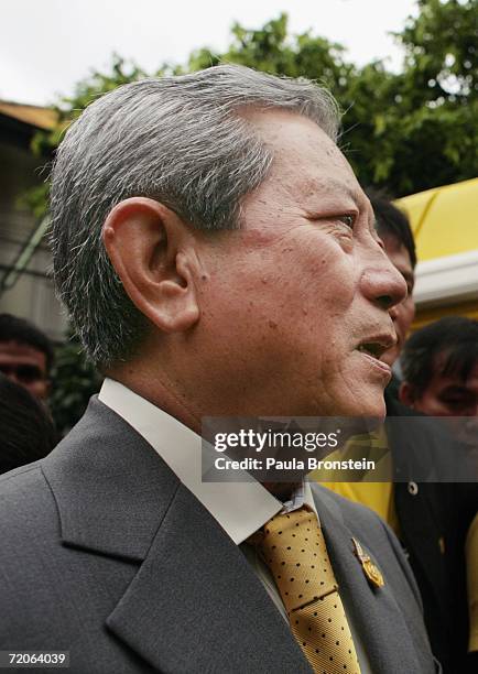 The new interim Prime Minister of Thailand, former army commander-in-chief Surayud Chulanont, arrives at a Thai temple on his first day at work...