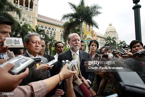 The new interim Prime Minister of Thailand, former army commander-in-chief Surayud Chulanont, holds a press briefing along side U.S. Ambassador to...