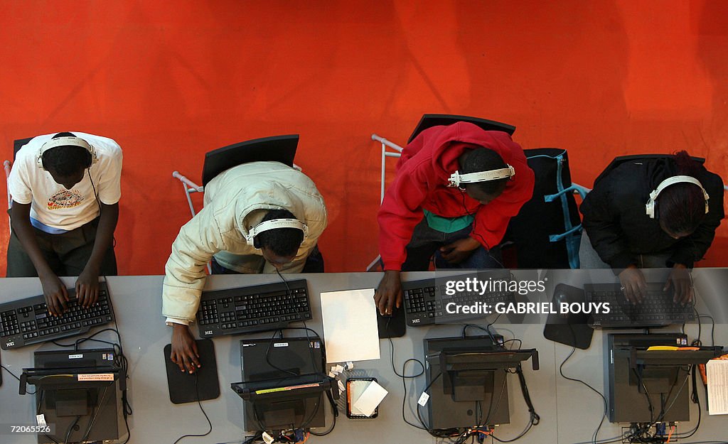 People work on computers in the main hall at the new Seattle Public ...