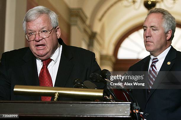 Speaker of the House Rep. Dennis Hastert speaks to the news media as Rep. John Shimkus , Chairman of the House Page Board, listens on Capitol Hill...