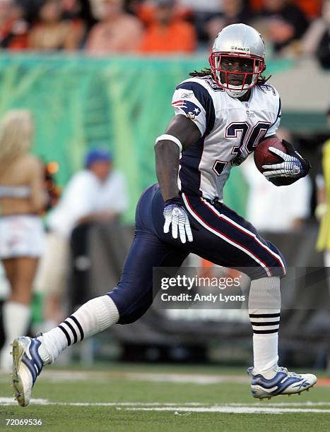 Laurence Maroney of the New England Patriots runs for a touchdown against the Cincinnati Bengals on October 1, 2006 at Paul Brown Stadium in...