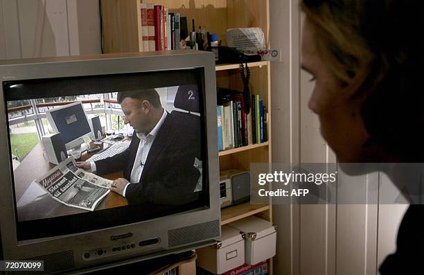 Norwegian television viewer watches TV2's "Dokument 2" program, depicting the recent strife surrounding the publication of cartoons of the prophet...