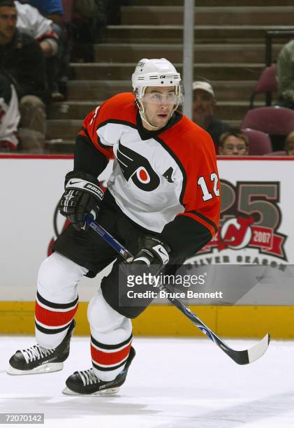 Simon Gagne of the Philadelphia Flyers skates during the game against the New Jersey Devils on September 28, 2006 at the Continental Airlines Arena...