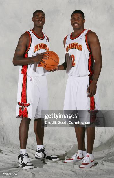 Marvin Williams and Joe Johnson of the Atlanta Hawks pose during media day at Philips Arena on October 2, 2006 in Atlanta, Georgia. NOTE TO USER:...