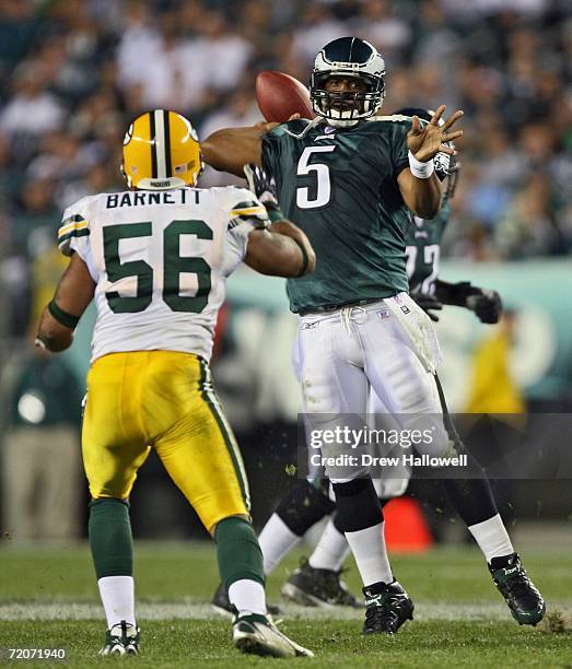 Quarterback Donovan McNabb of the Philadelphia Eagles throws a pass past linebacker Nick Barnett of the Green Bay Packers on October 2, 2006 at...