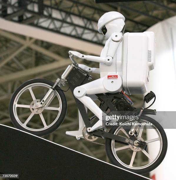 Japan's electronics equipment maker MuRata Manufacturing Co., Ltd's showcased their new bicycle-riding robot 'MURATA BOY' during the CEATEC Japan...