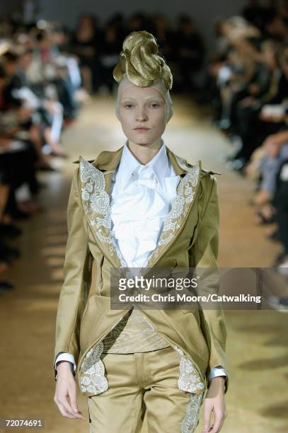 Model walks down the catwalk during the Junya Watanabe Fashion Show as part of Paris Fashion Week Spring/Summer 2007 on October 2, 2006 in Paris,...