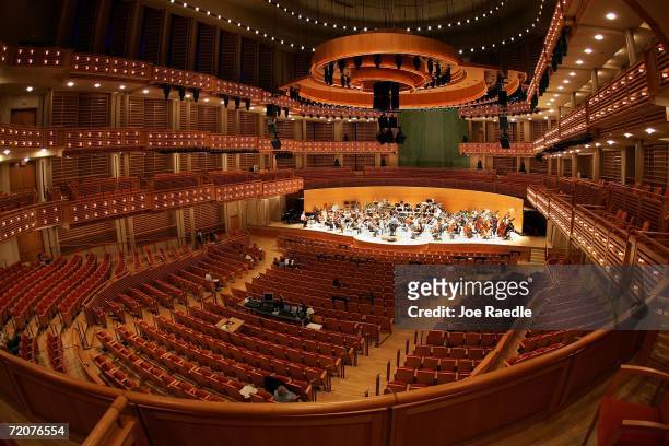 The New World Symphony rehearses on stage at The Knight Concert Hall in the Carnival Center for the Performing Arts October 3, 2006 in Miami,...