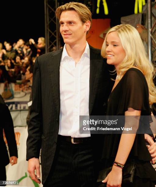Tim Borowski and his wife Lena attend the premiere of the film "Deutschland ein Sommermaerchen" at the Berlinale Palast on October 3, 2006 in Berlin,...