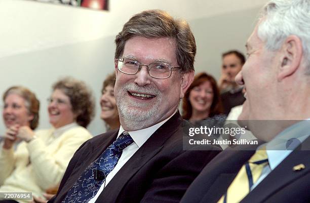 Berkeley astrophysicist professor George Smoot laughs with UC Berkeley Chancellor Robert J. Birgeneau during a press conference announcing his...