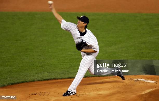 Chien-Ming Wang of the New York Yankees pitches to the first batter in the first inning of Game One of the American League Division Series against...