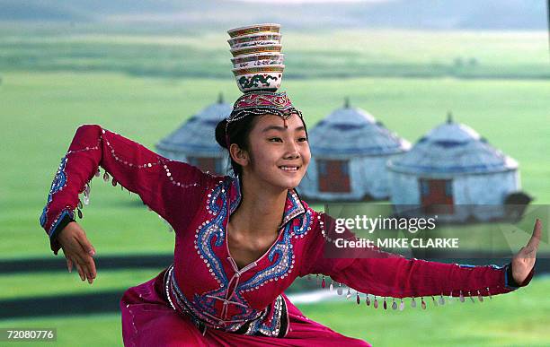 Dancer performs traditional Mongolian Dance as part of a performance to celebrate the forthcoming Mid-Autumn Lantern carnival in Hong Kong, 04...