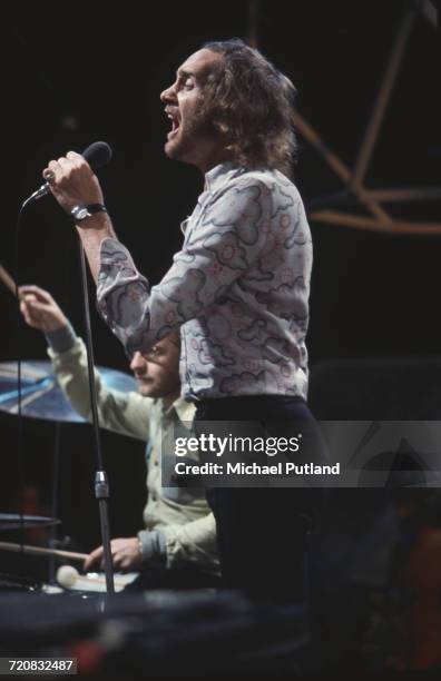 Singer Roger Chapman performing with English rock group Family on the BBC television show 'Top of the Pops', London, 4th August 1971. On the left is...