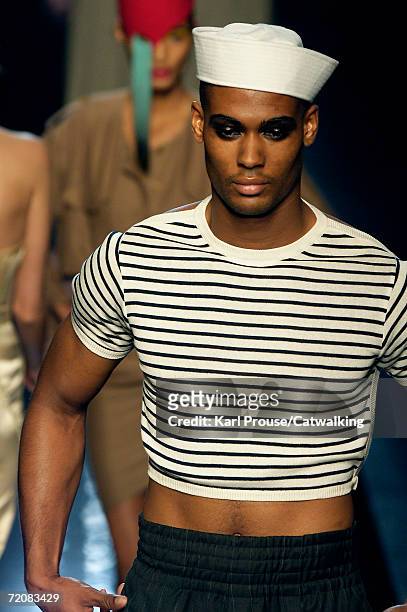 Model walks down the catwalk during the Jean-Paul Gaultier Retro Fashion Show as part of Paris Fashion Week Spring/Summer 2007 on October 3, 2006 in...