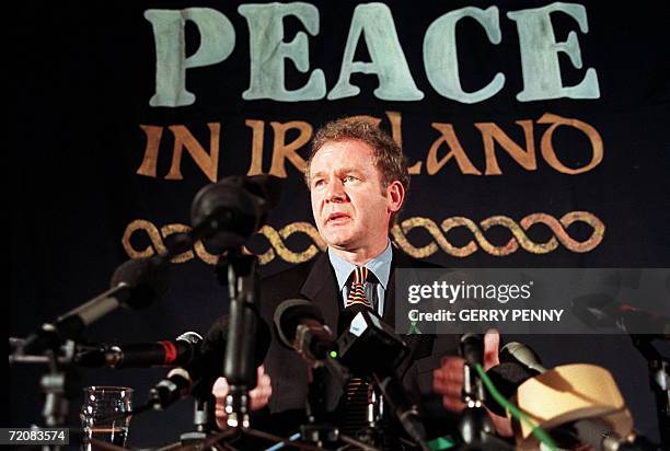 London, UNITED KINGDOM: Sinn Fein chief negotiator Martin McGuinness answering journalists' question during a press conference in London, 26 February...