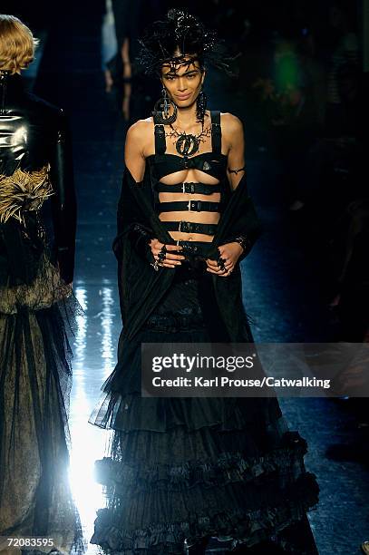 Model walks down the catwalk during the Jean-Paul Gaultier Retro Fashion Show as part of Paris Fashion Week Spring/Summer 2007 on October 3, 2006 in...